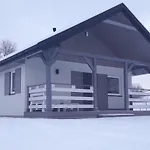 Деревянный коттедж Komfort Caloroczne