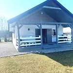 Деревянный коттедж Komfort Caloroczne *